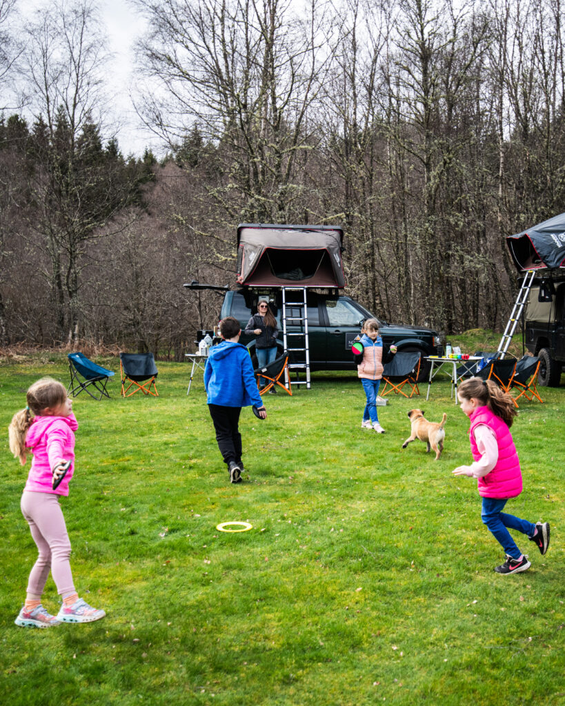 Kids playing at a campsite