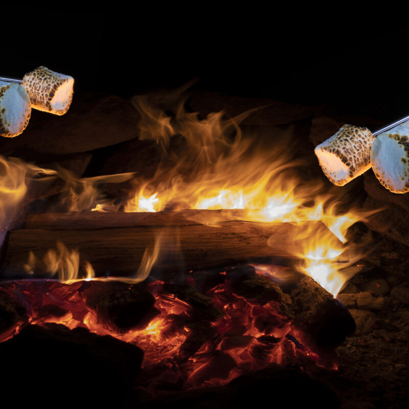 S'mores cooking over an open fire