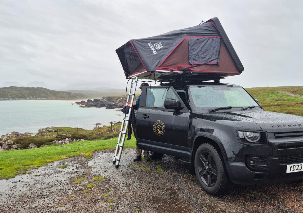 Defender 90 camping by loch