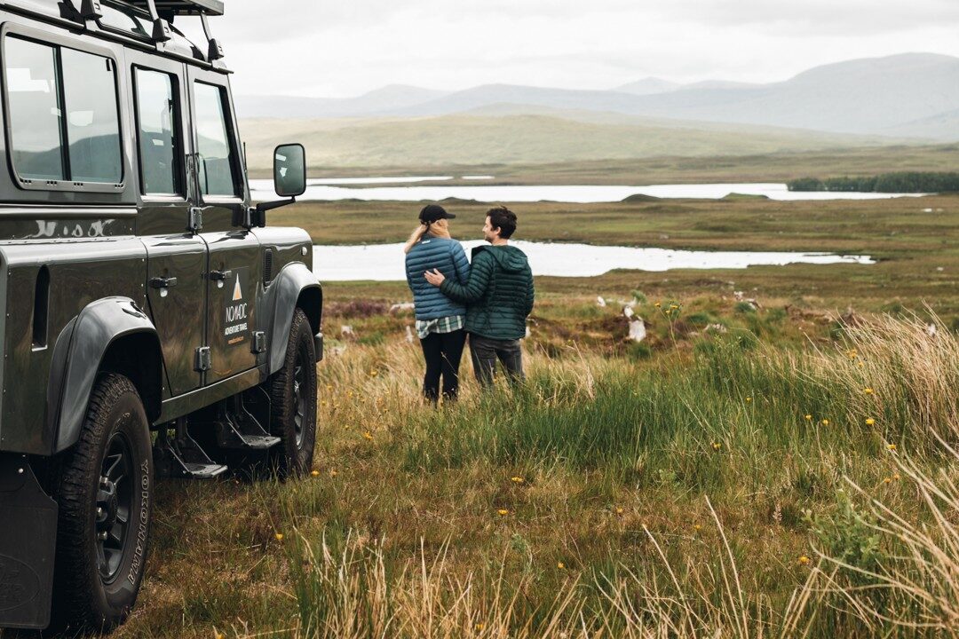 Land Rover Defender on a Highland road